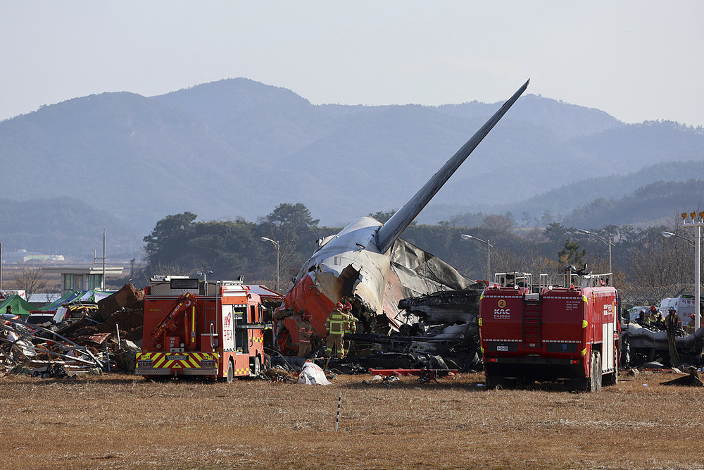 韩国客机起火已致58人死亡